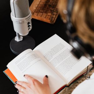 unrecognizable female audiobook narrator recording audiobook